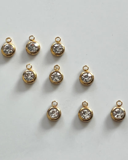 Charm Goccia di luce (variante oro)